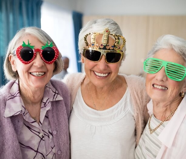 A group of seniors using unique glasses on the Community Networks and Activities program
